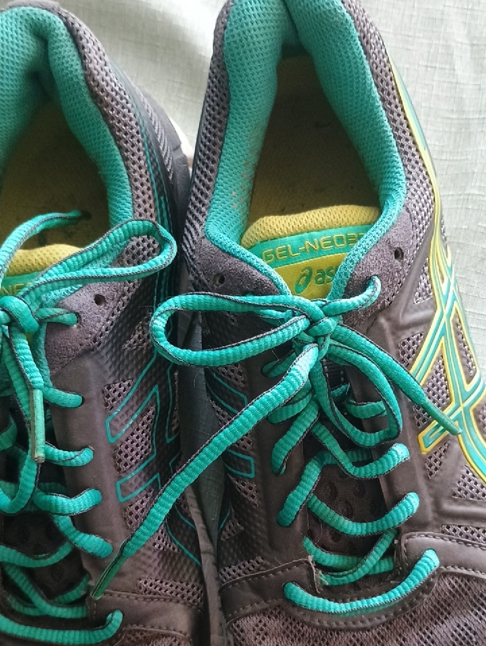 Asics Gray Running Shoes with Teal Laces and Yellow Accents